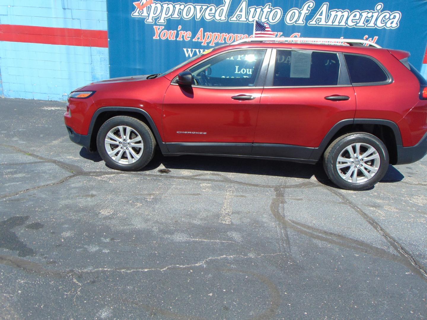 2015 Red Jeep Cherokee (1C4PJLAB2FW) with an 4-Cyl 2.4 Liter engine, Automatic, 9-Spd transmission, located at 2105 Dixie Hwy, Louisville, KY, 40210, (502) 772-3333, 38.220932, -85.795441 - Photo#0